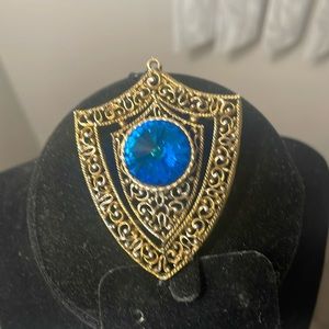 Vintage Crest Pendant with Blue Crystal